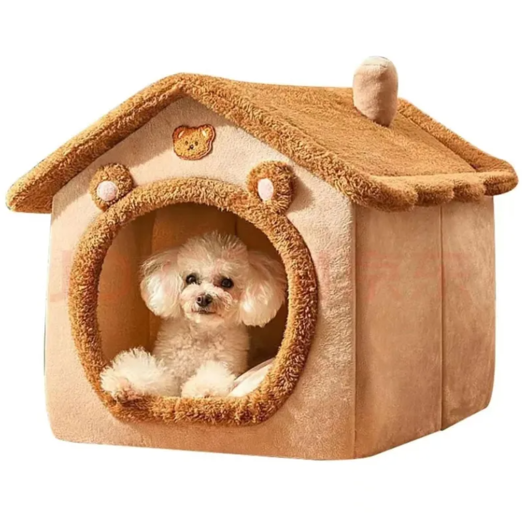 Cat resting inside the PACKCO Warm Pet House
